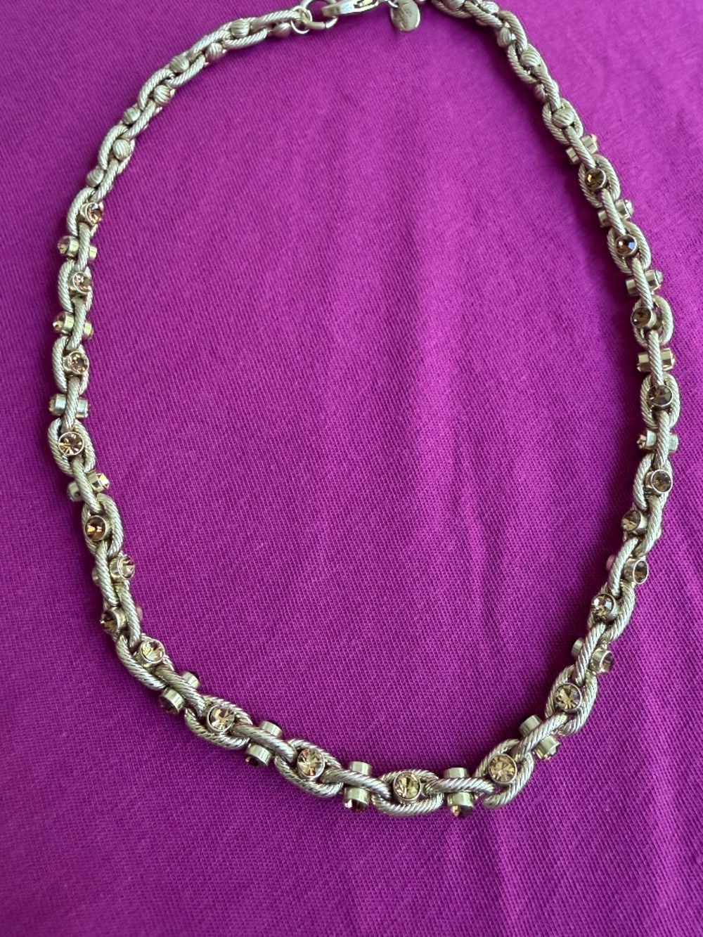 16" gold tone Kiam necklace with yellow sparkling stones throughout a link chain